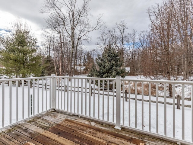 view of snow covered deck