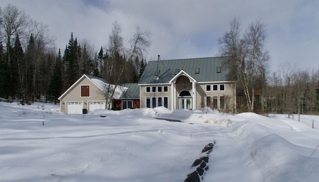 view of front of property with metal roof and a standing seam roof