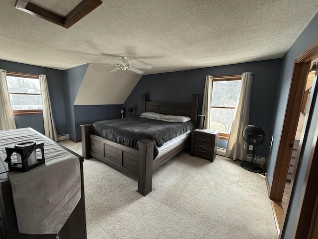 bedroom featuring light carpet, multiple windows, a ceiling fan, and vaulted ceiling