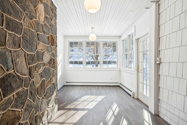 unfurnished sunroom with wooden ceiling