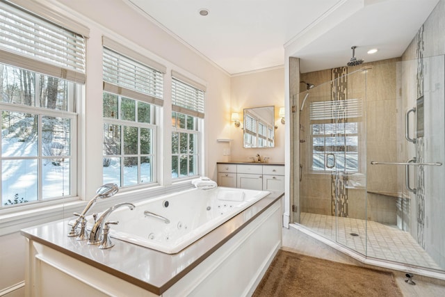 full bath with plenty of natural light, a shower stall, and ornamental molding