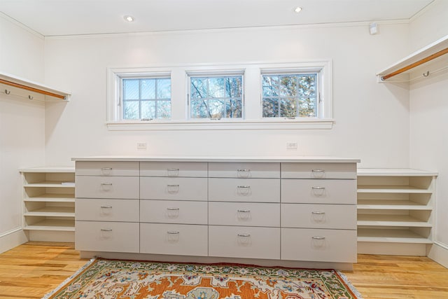 walk in closet featuring light wood-type flooring