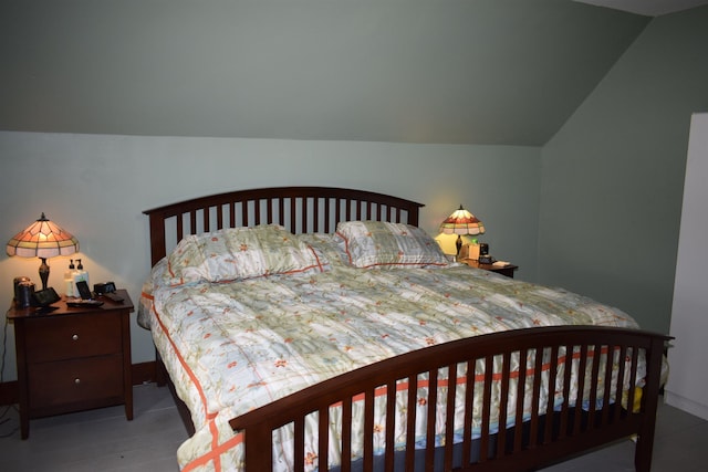 bedroom featuring vaulted ceiling