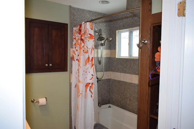 full bathroom with shower / bath combination with curtain