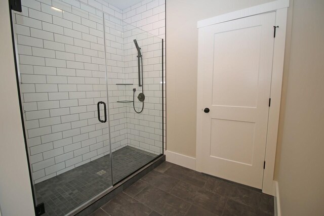 bathroom featuring a shower stall