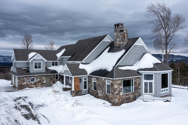 exterior space featuring stone siding