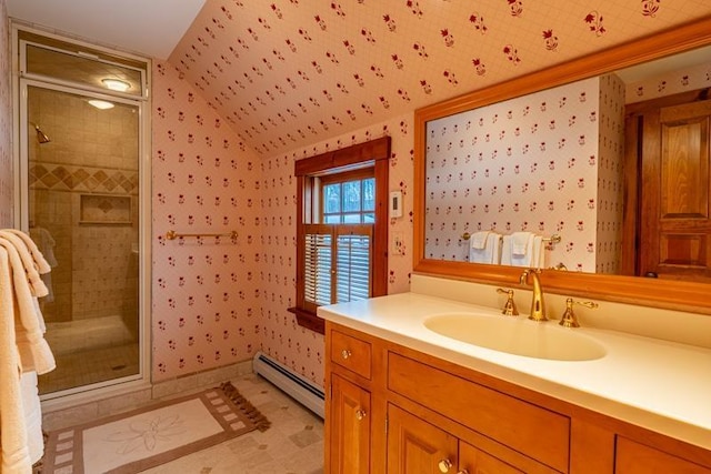 full bathroom featuring a baseboard heating unit, vanity, a shower stall, and wallpapered walls