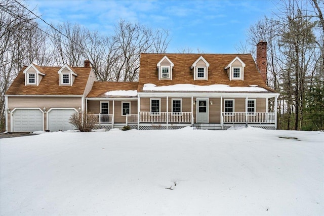 cape cod home featuring covered porch, an attached garage, and a chimney