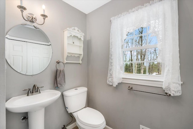 bathroom with a sink and toilet