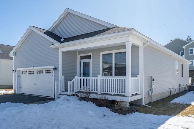 view of front of property featuring a porch, cooling unit, and a shingled roof