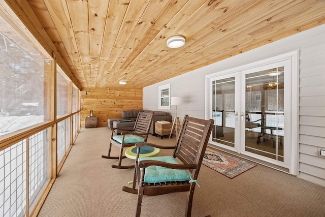 sunroom with french doors and wooden ceiling