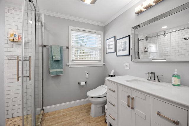 full bathroom featuring baseboards, a stall shower, and crown molding