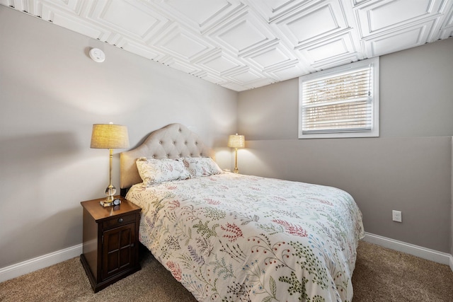 carpeted bedroom with baseboards