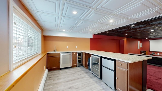 kitchen featuring an ornate ceiling, wine cooler, dishwasher, and refrigerator