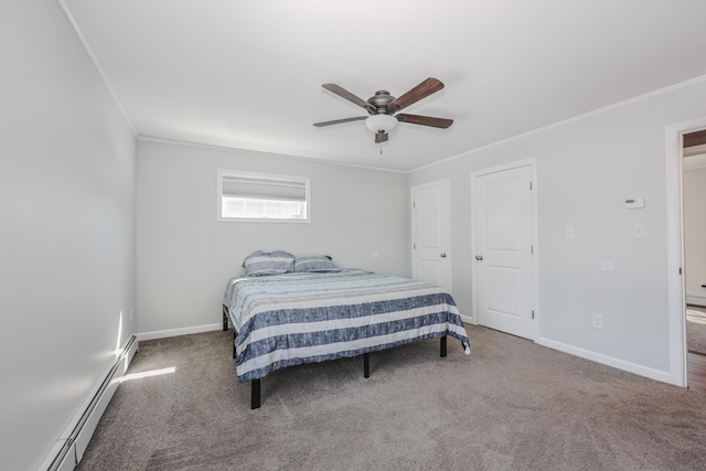 bedroom with baseboard heating, crown molding, and carpet