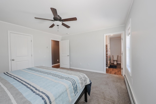 bedroom featuring ornamental molding, baseboards, carpet floors, and a baseboard radiator