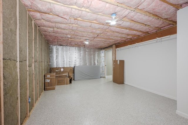 unfinished basement featuring baseboards