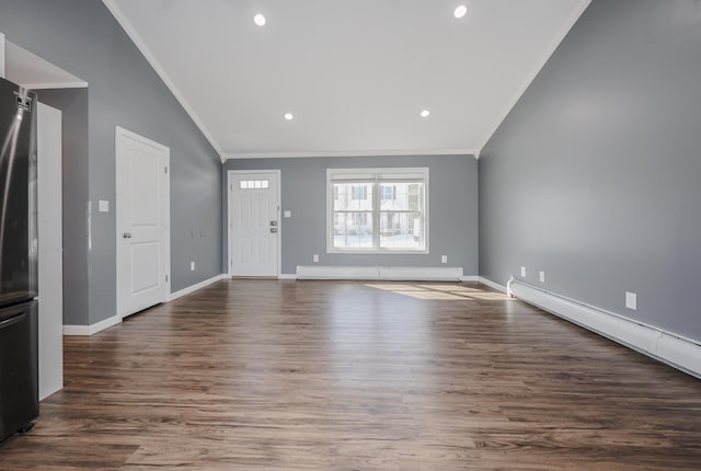 unfurnished living room with a baseboard heating unit, wood finished floors, baseboards, and ornamental molding