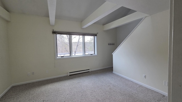 carpeted empty room with a baseboard heating unit, beam ceiling, and baseboards