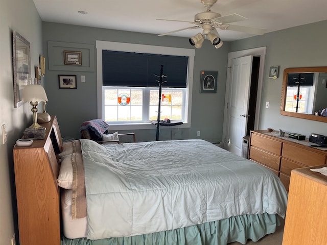 bedroom featuring ceiling fan