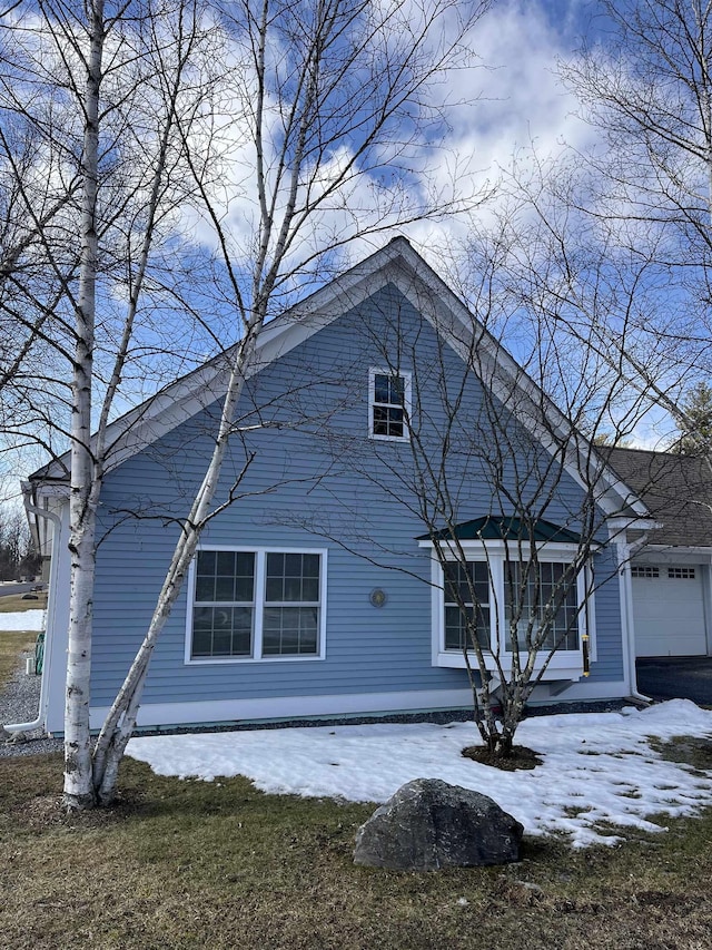 view of home's exterior with a garage