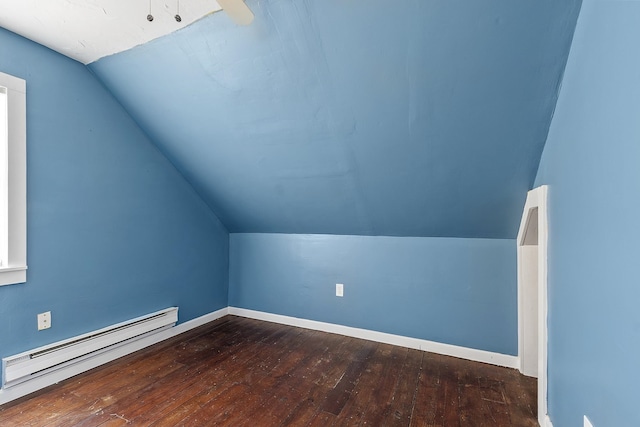 bonus room featuring hardwood / wood-style floors, vaulted ceiling, baseboards, and a baseboard radiator