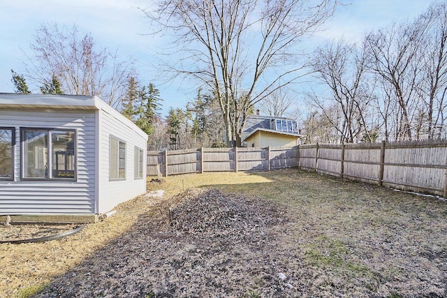 view of yard featuring a fenced backyard