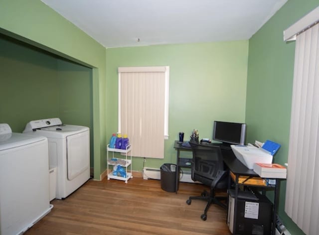 office with washing machine and dryer and wood finished floors