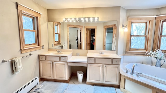 full bathroom with double vanity, a sink, a baseboard heating unit, tile patterned floors, and a jetted tub