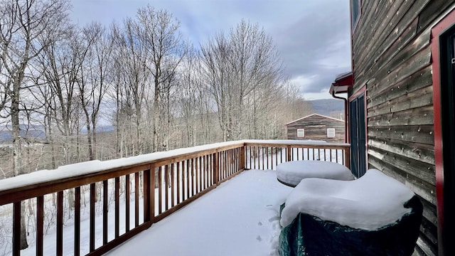 view of snow covered deck