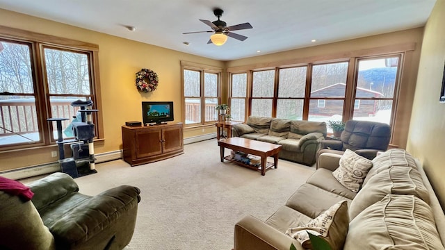 living area with recessed lighting, light colored carpet, baseboard heating, and ceiling fan