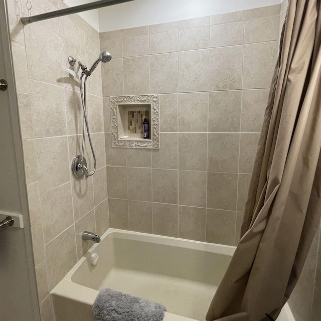 full bathroom with shower / bath combo