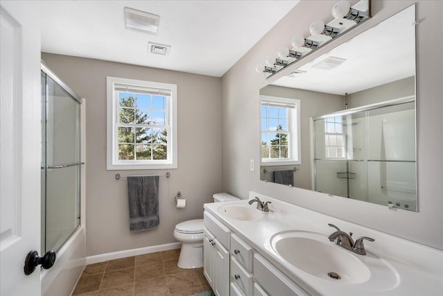 full bath with a sink, visible vents, baseboards, and toilet