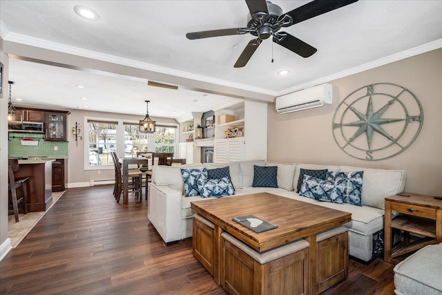 living area featuring dark wood-style floors, baseboard heating, crown molding, and a wall unit AC