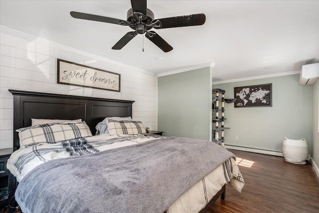 bedroom with wood finished floors, a wall unit AC, crown molding, a baseboard radiator, and baseboards