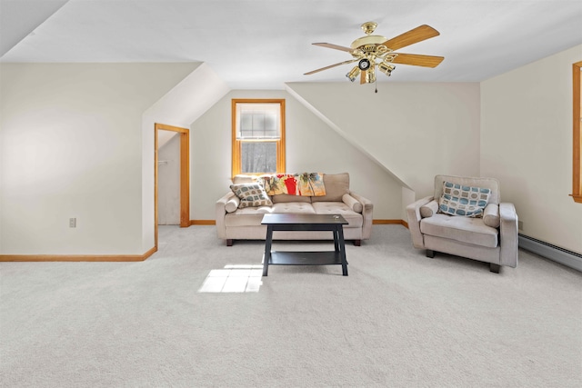 living room featuring baseboards, a ceiling fan, carpet, and vaulted ceiling