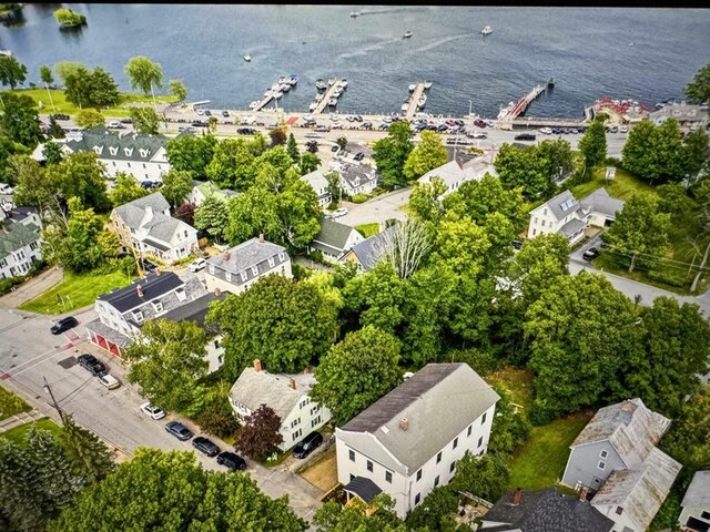 bird's eye view with a residential view and a water view