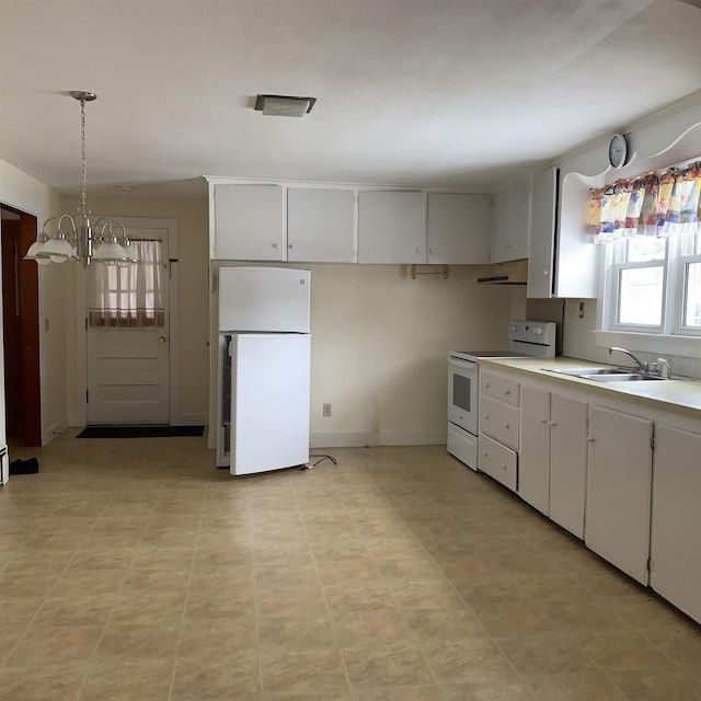 kitchen with light countertops, a notable chandelier, white appliances, white cabinetry, and a sink