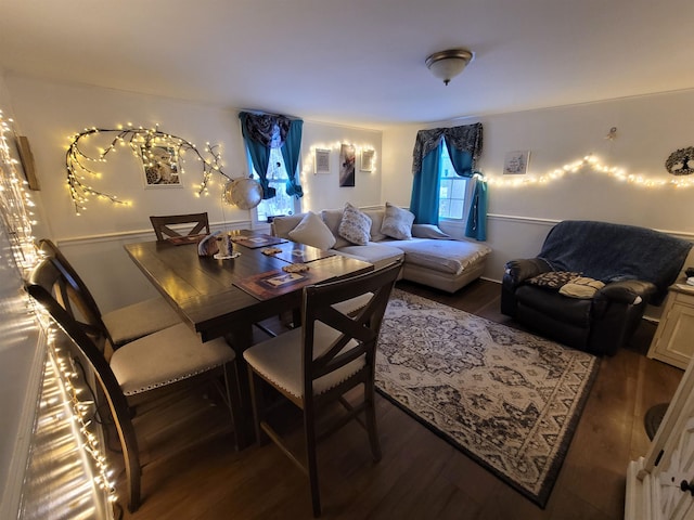 dining room with wood finished floors