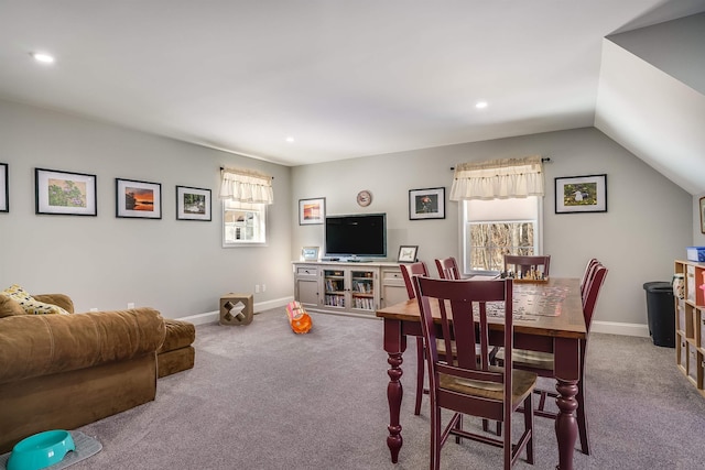 carpeted dining room featuring vaulted ceiling, recessed lighting, and baseboards