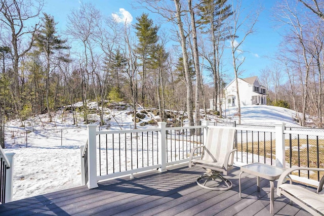 view of snow covered deck