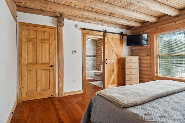 bedroom with baseboards, log walls, wood-type flooring, a barn door, and wooden ceiling