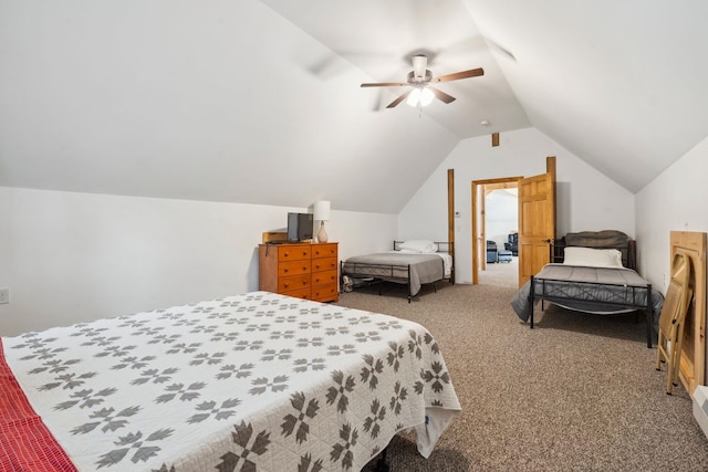 bedroom with lofted ceiling, carpet flooring, and a ceiling fan