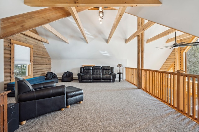 living area featuring vaulted ceiling with beams, log walls, a ceiling fan, and carpet floors