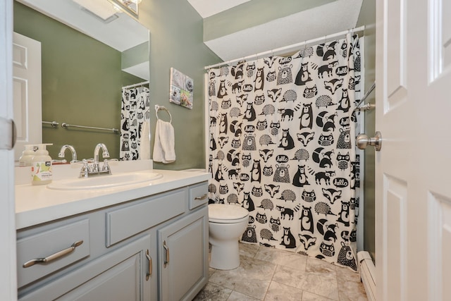 bathroom featuring vanity, toilet, a shower with curtain, and a baseboard heating unit