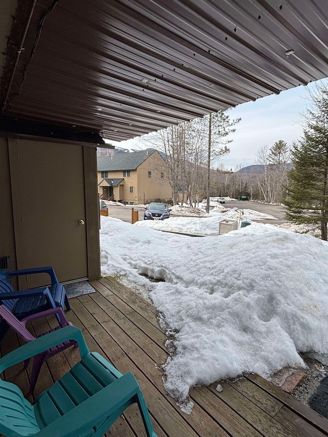 view of snow covered deck