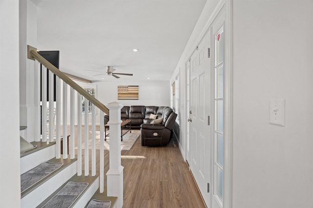 entryway with stairs, recessed lighting, wood finished floors, and a ceiling fan