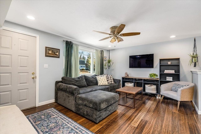 living room with a ceiling fan, recessed lighting, wood finished floors, and baseboards