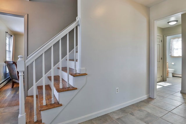 stairway with baseboards