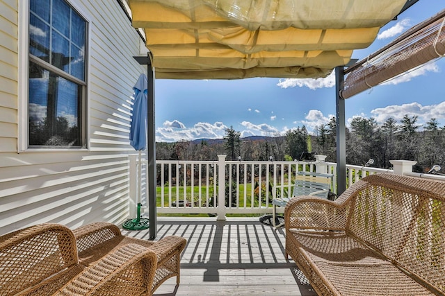 view of wooden balcony featuring a wooden deck